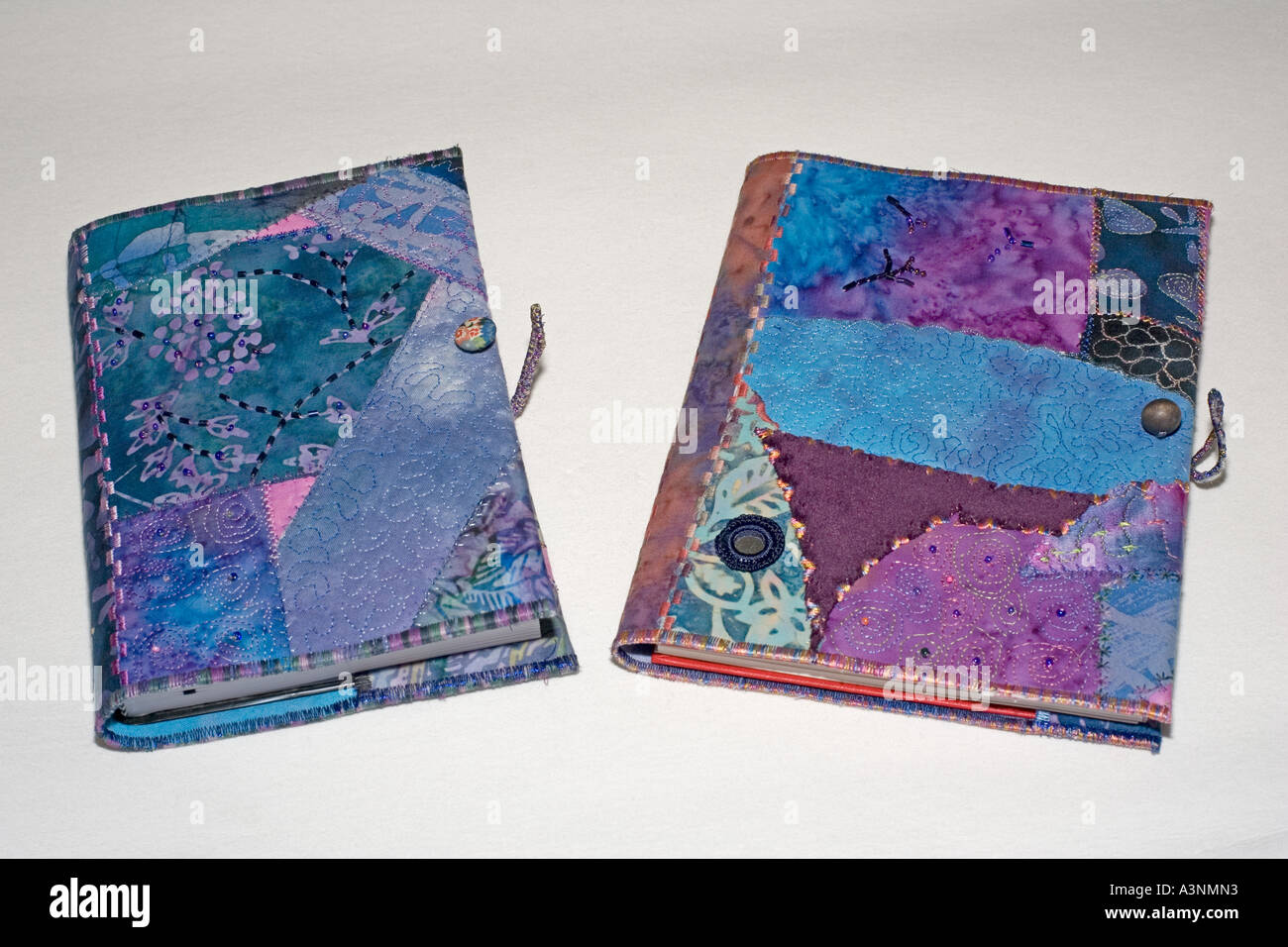 Colourful patchwork covers on desk diaries Cotswolds UK Stock Photo