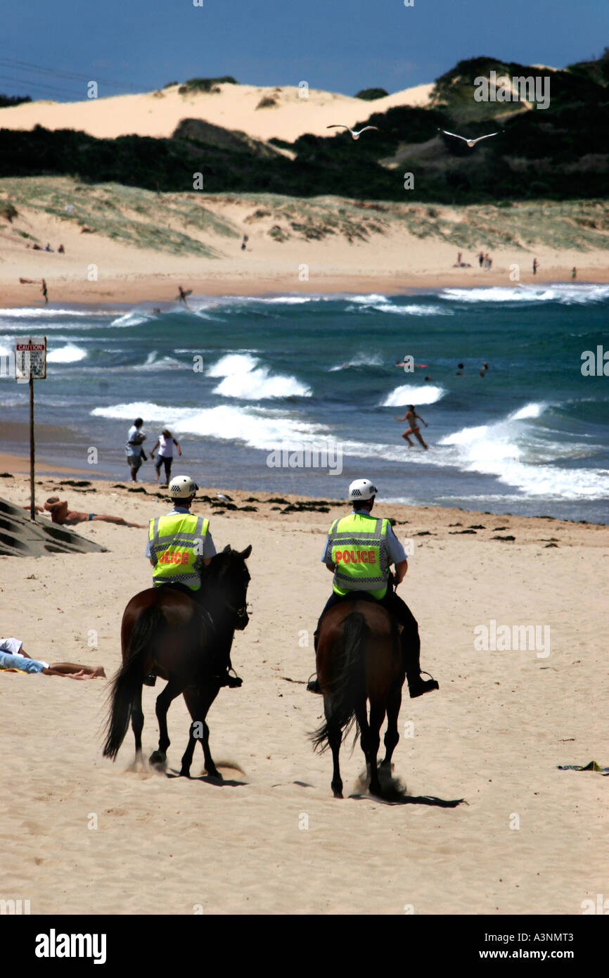 Mounted Police patrol North Cronulla beach Sydney Australia after race riots in the suburb Stock Photo