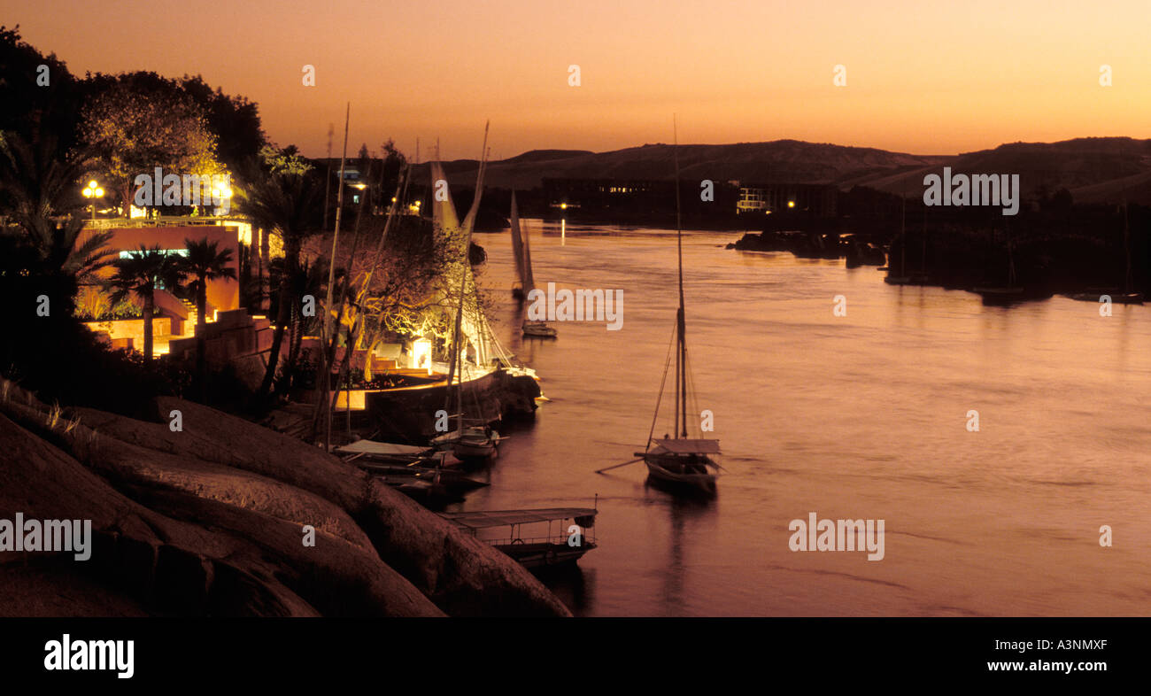 Nile at Aswan in Egypt twilight at Old Cataract Hotel Stock Photo