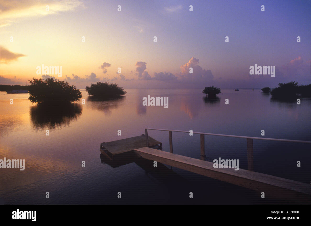 A Calm And Still Sunrise With Boat Ramp In Key West Florida, USA Stock Photo