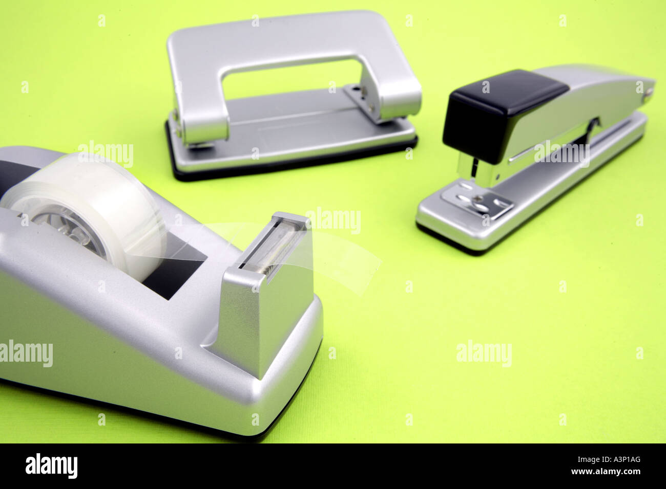 Stapler, Tape dispenser and holepunch Stock Photo Alamy