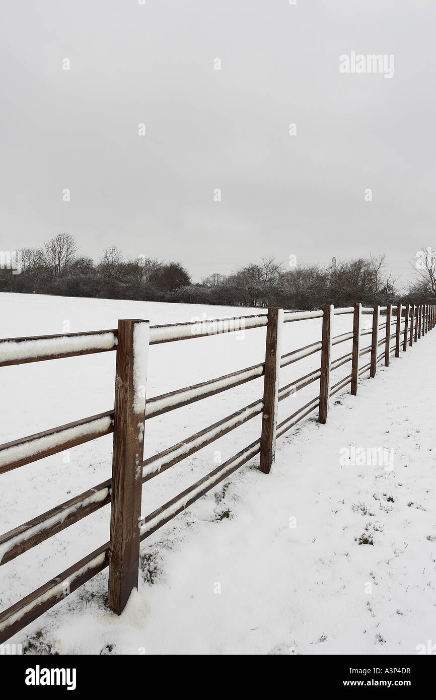 Wooden fence on snow hi-res stock photography and images - Alamy