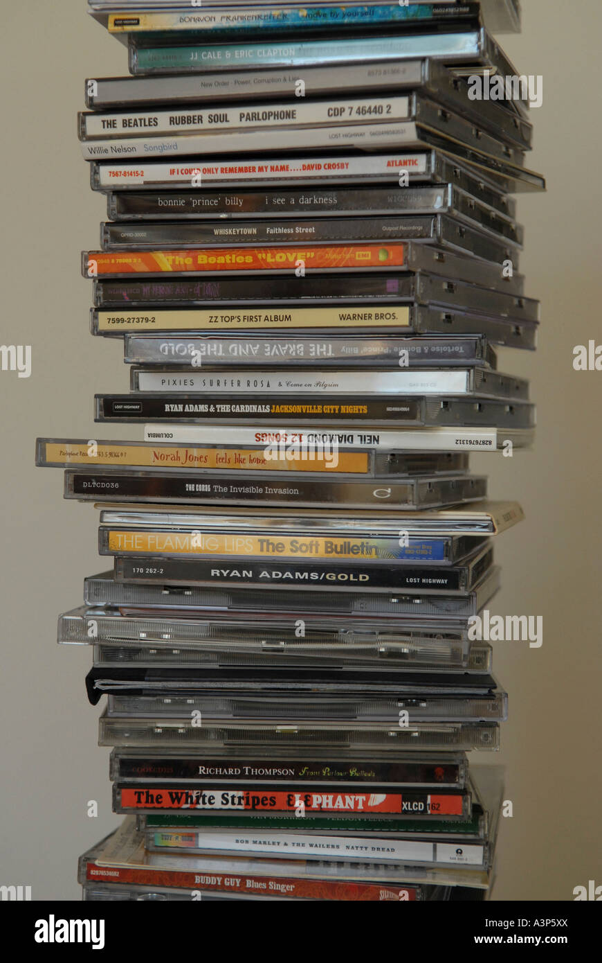 A stack of compact discs part of a large cd collection Stock Photo Alamy