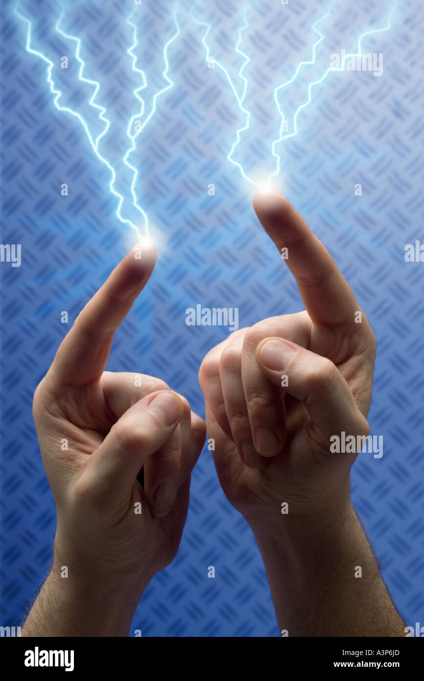 HANDS WITH LIGHTNING COMING FROM FINGERTIPS AND ELECTRICITY POWER AT