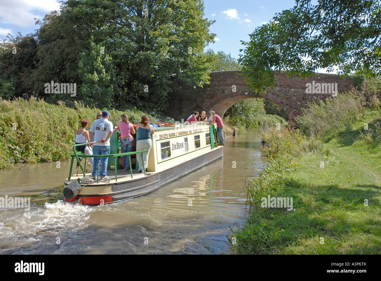 Family enjoying day out on hired day boat on Kennet & Avon canal, Wiltshire, England Stock Photo