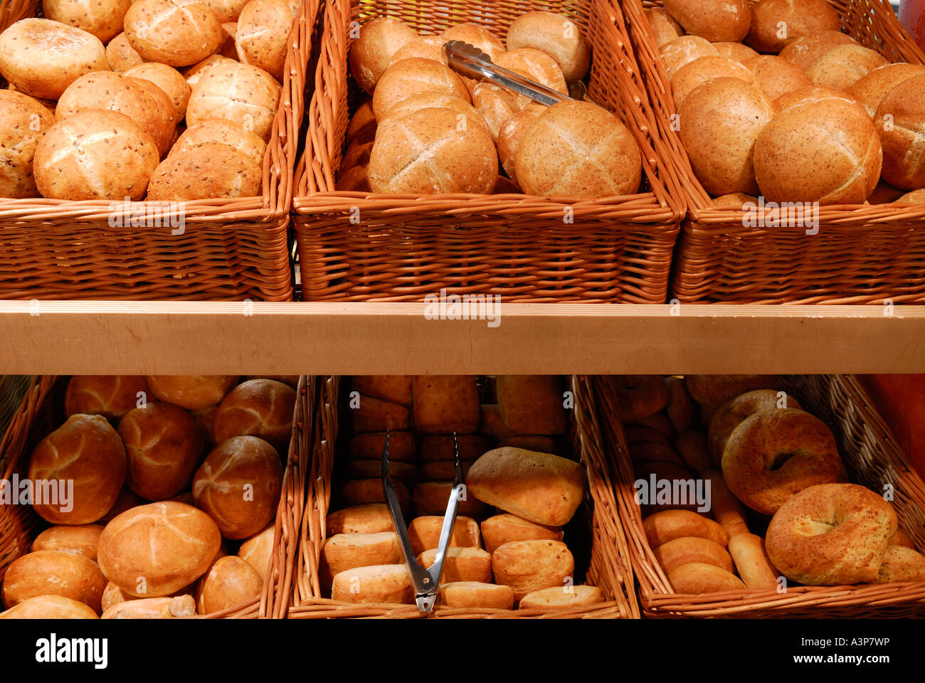 Baskets of fresh buns at the market bakery Stock Photo Alamy