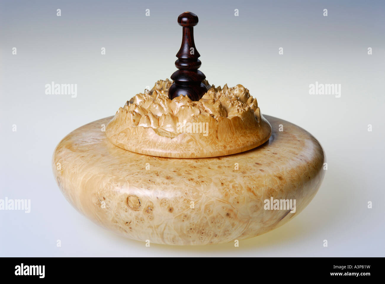 Hand made Maple burl wood turned bowl with Rosewood lid handle on white