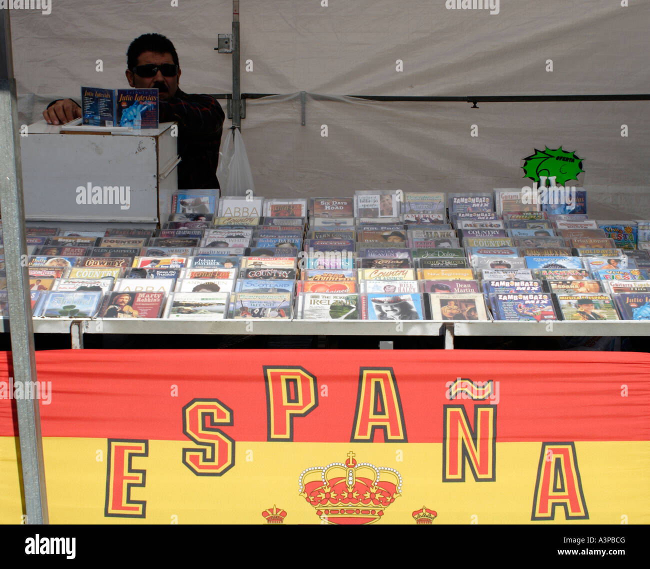 CD vendor in Spanish street market Stock Photo - Alamy