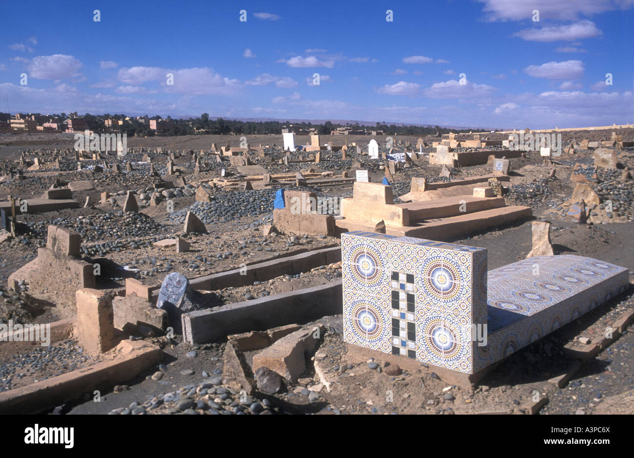 Muslim cemetery showing new grave decorated with Zelige tiles in Jebel Erfoud southern Morocco Stock Photo