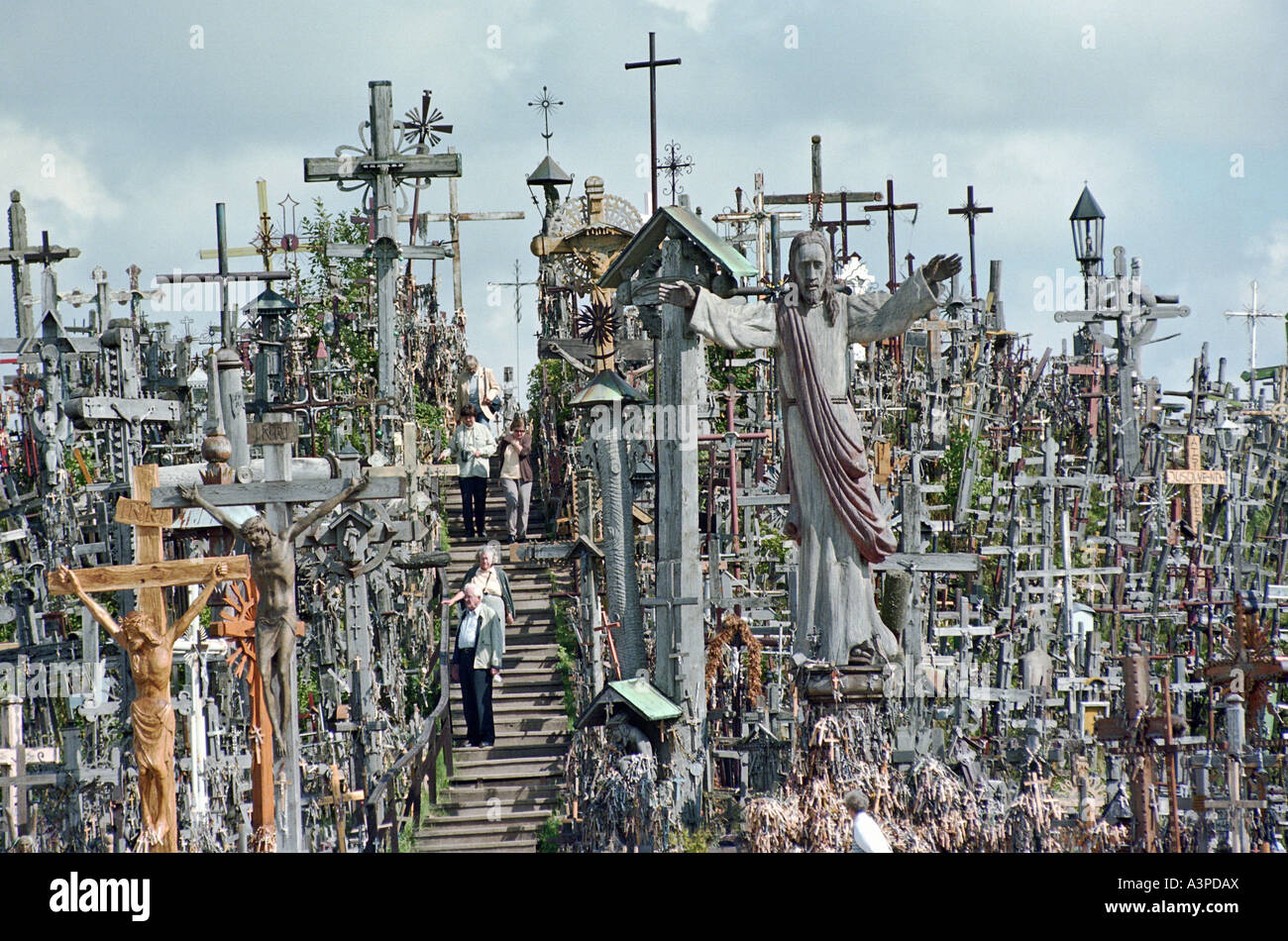 Pilgrims on the Hill of Crosses, Lithuania Stock Photo
