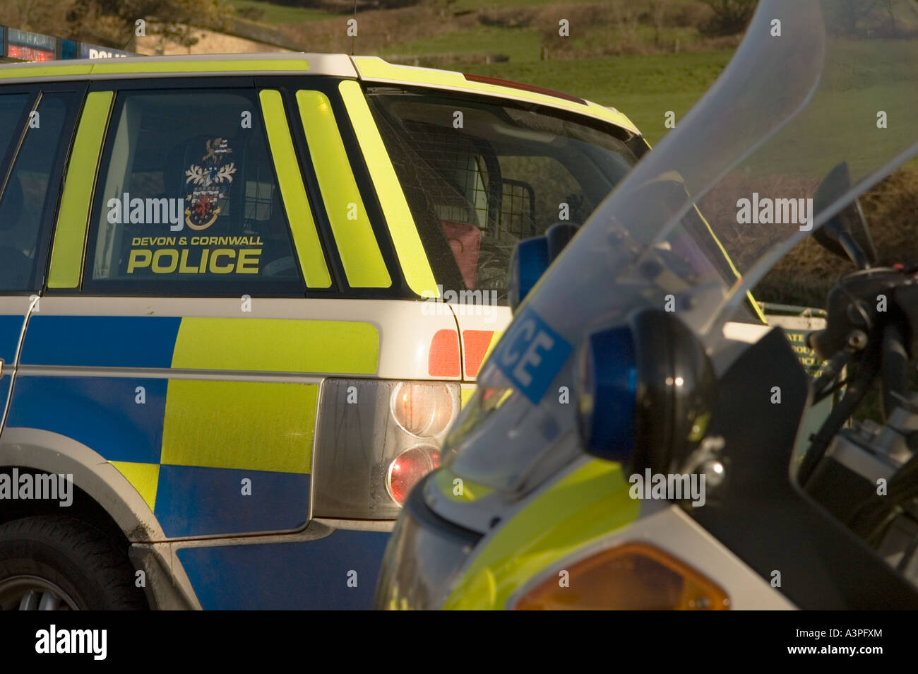 Devon and Cornwall police vehicles in a car park in Branscombe Stock Photo