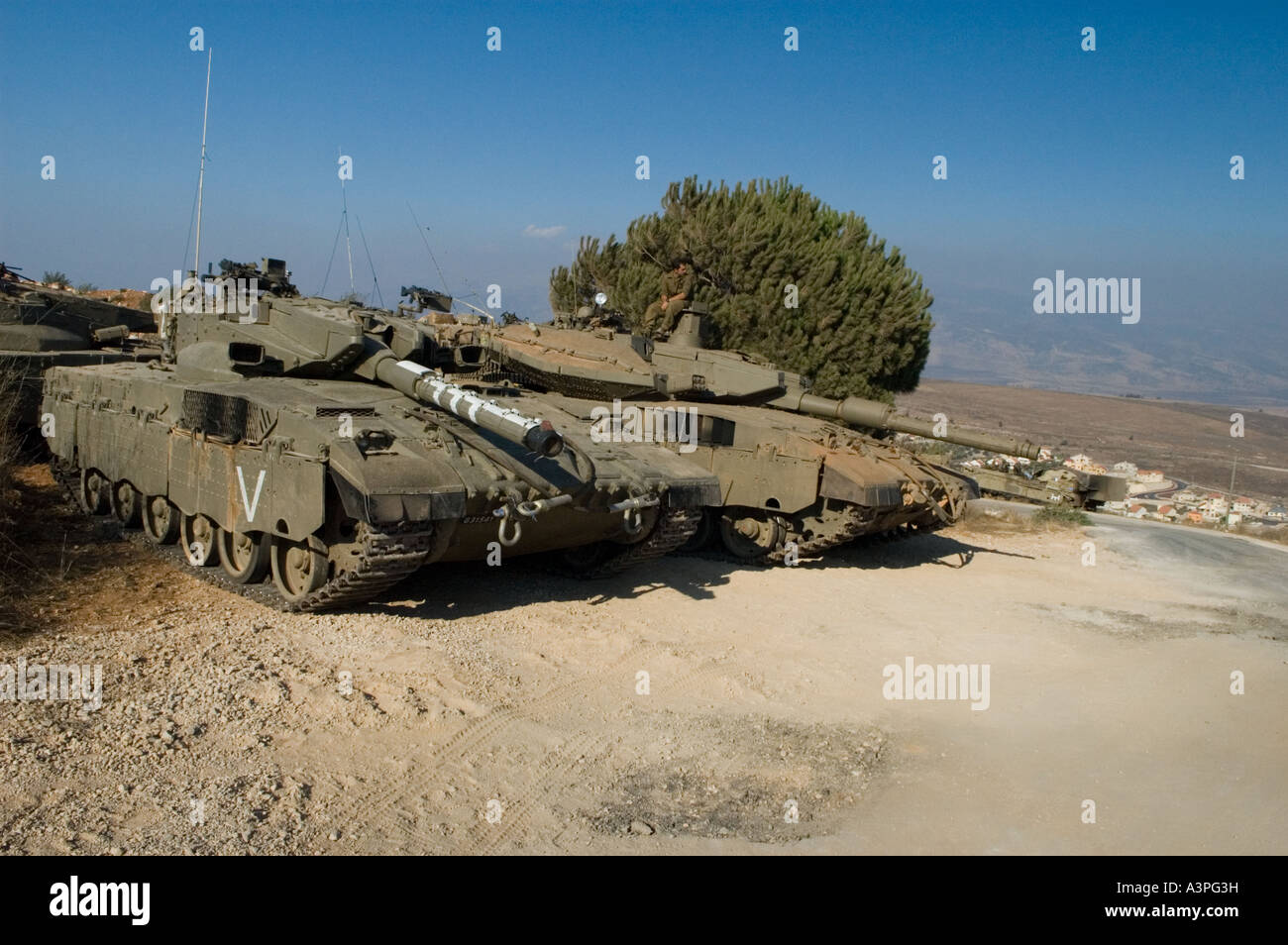 Merkava tanks waiting deployment in Metula, Northern Israel Stock Photo
