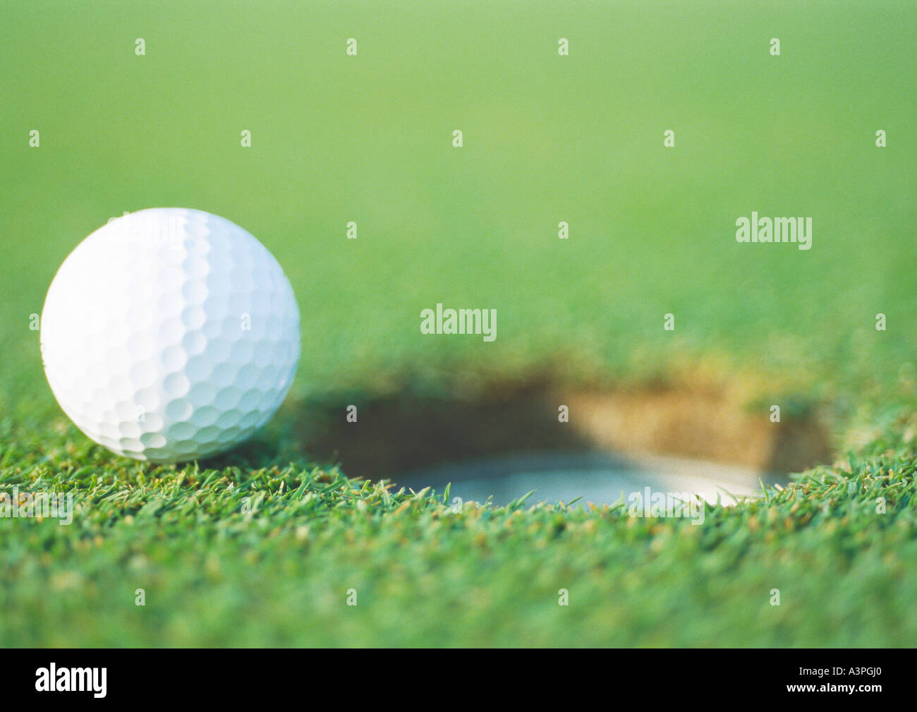 Golf ball hole hires stock photography and images Alamy