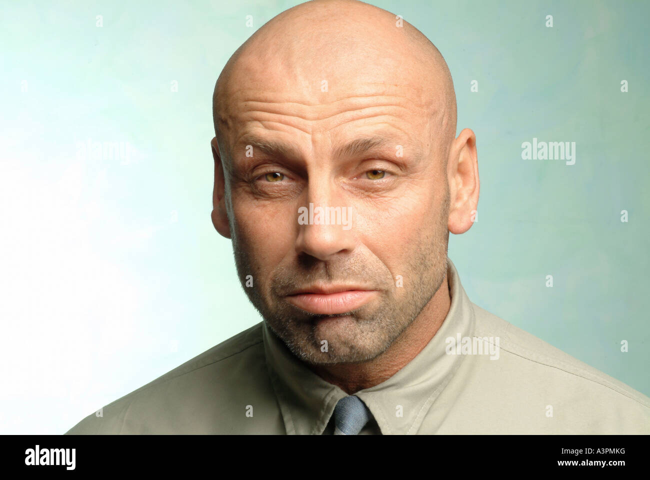 Man with a sleepy look on his face Stock Photo - Alamy