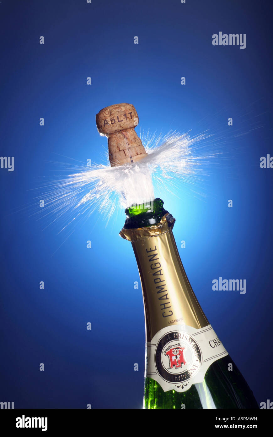Cork shooting out of a champagne bottle Stock Photo Alamy