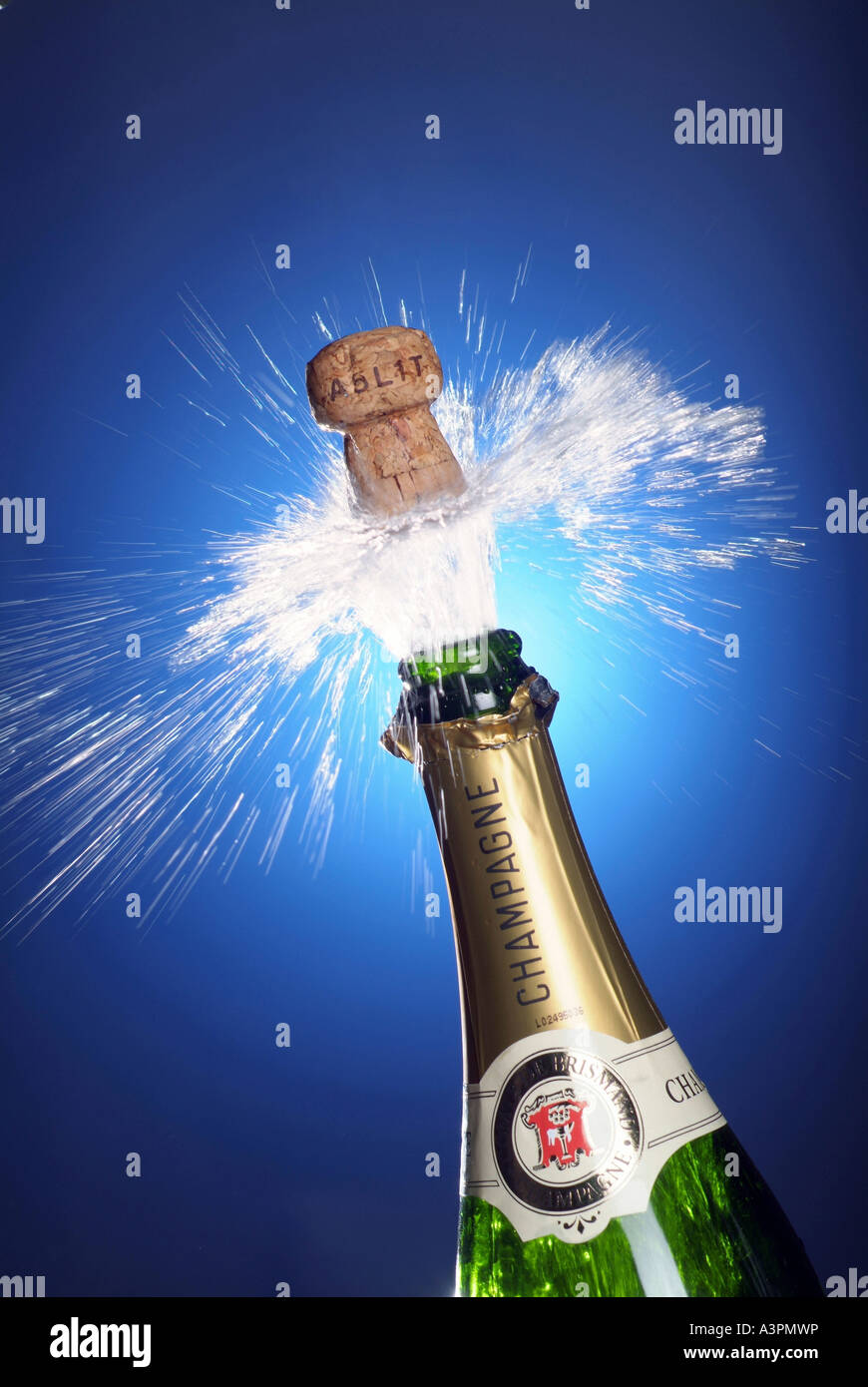 Cork shooting out of a champagne bottle Stock Photo Alamy