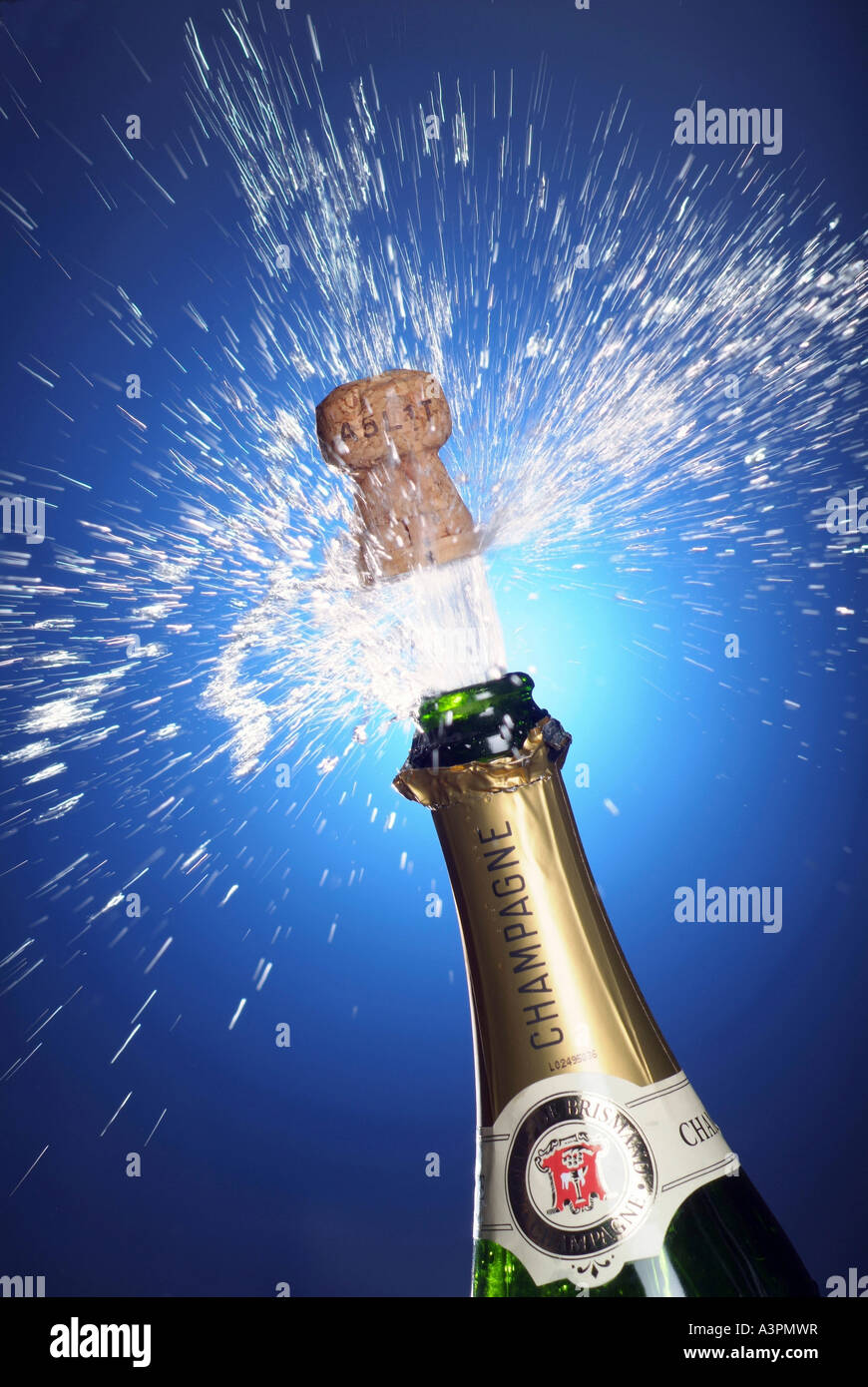 Cork shooting out of a champagne bottle Stock Photo Alamy