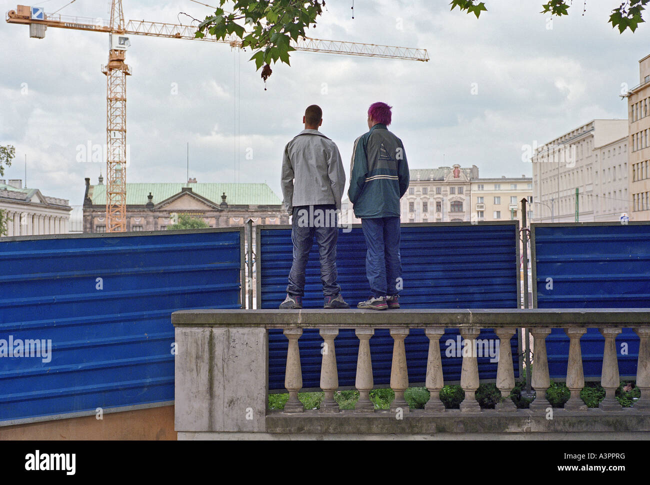 Curious people watching a construction site in Poznan, Poland Stock Photo