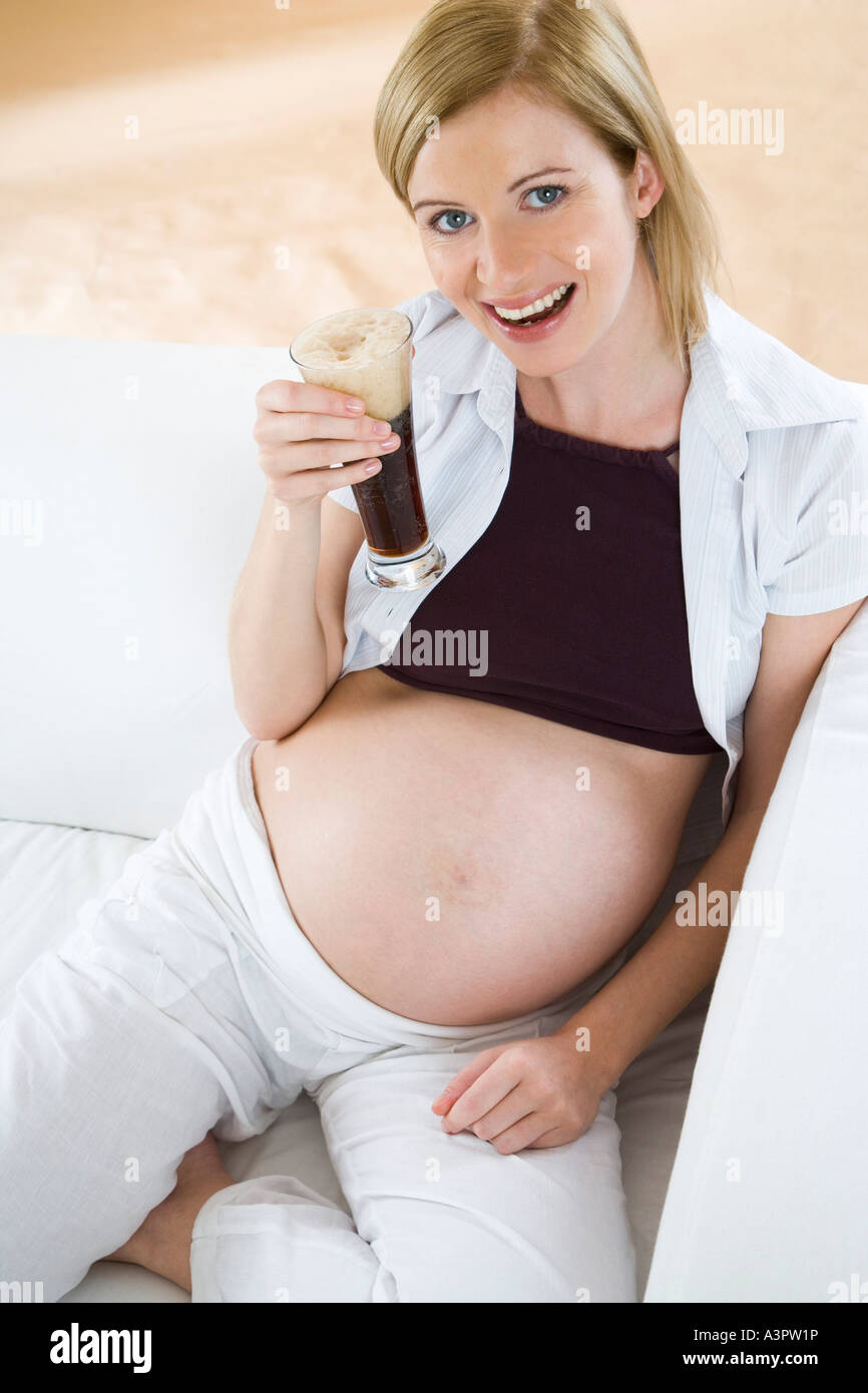 Pregnant Woman Drinking Non Alcoholic Beer Stock Photo Alamy