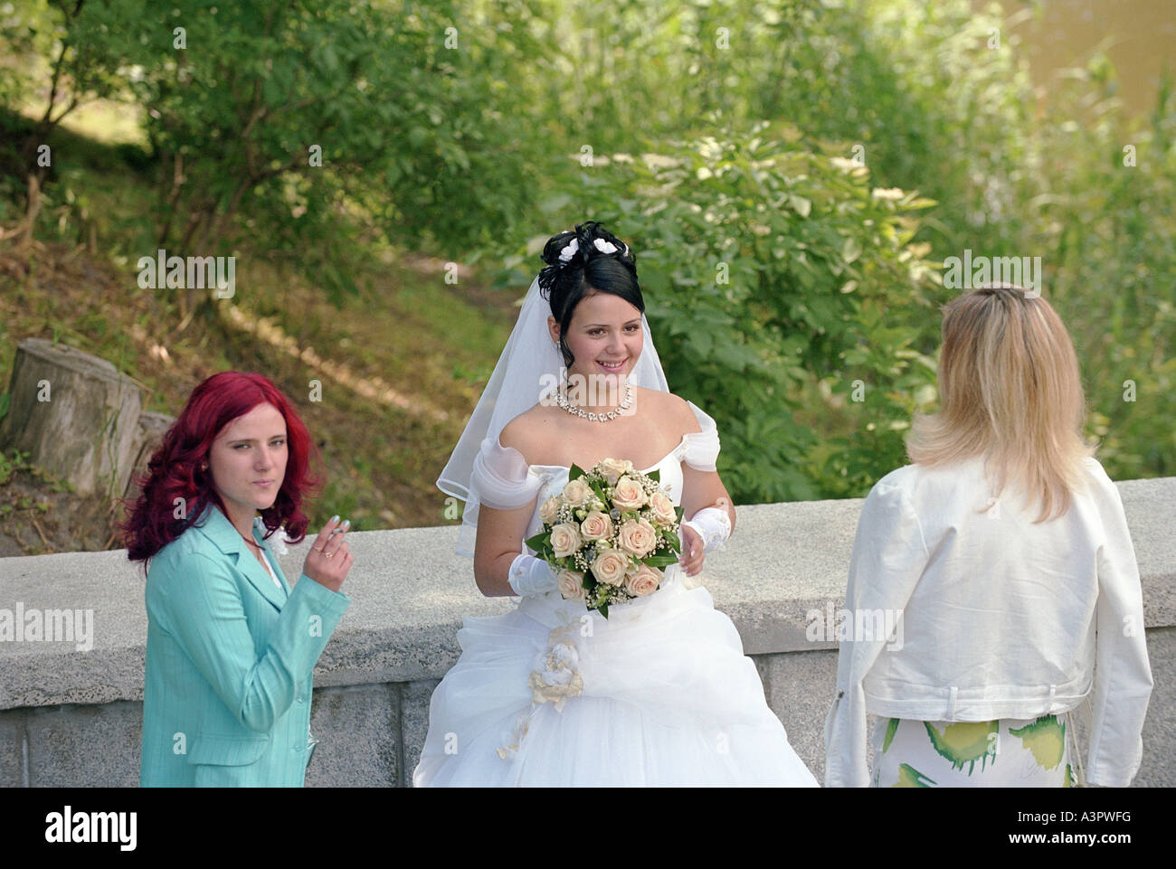 Bride smoking cigarette wedding hi-res stock photography and images - Alamy