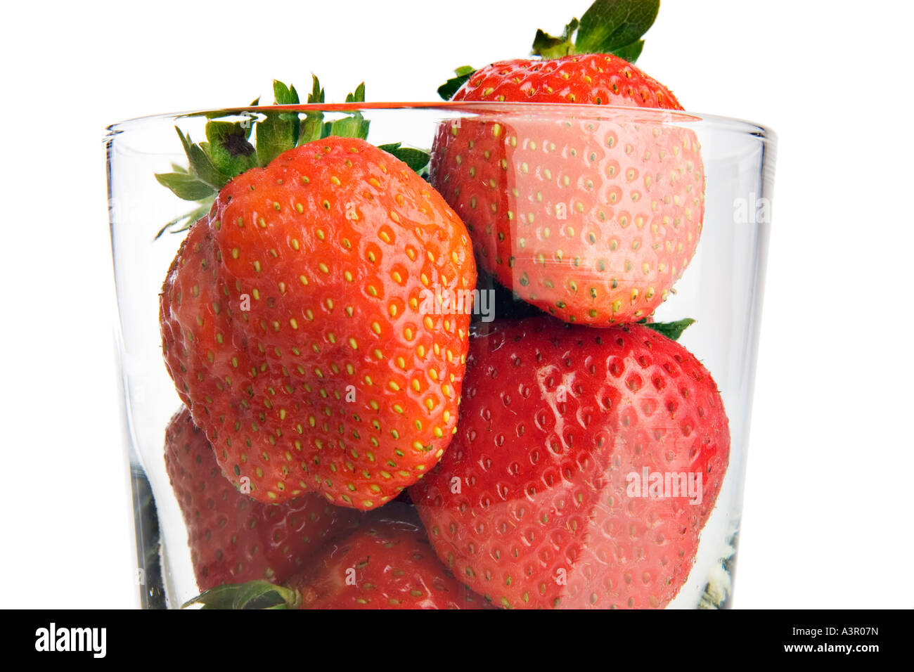 Glass full of strawberries Stock Photo - Alamy