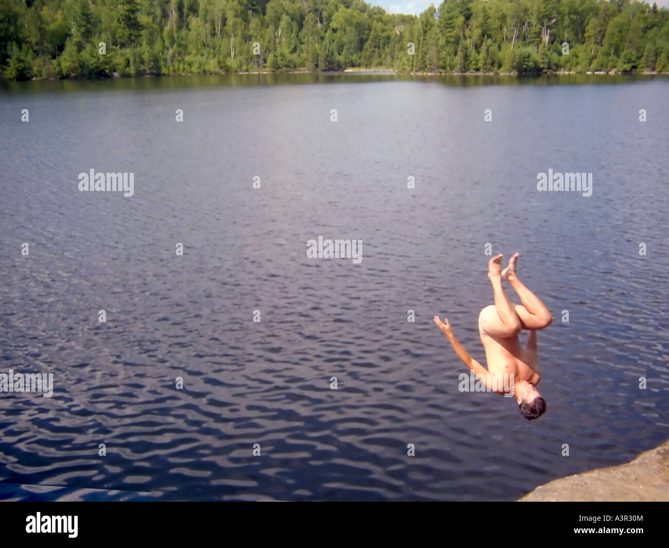 Skinny dipping in a northern lake. Stock Photo