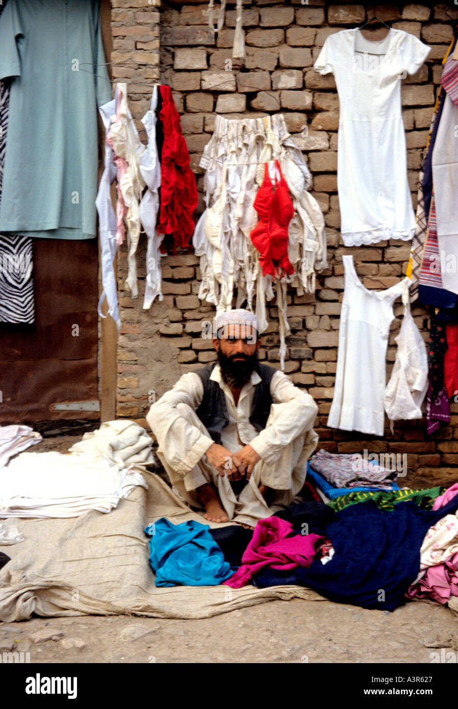 Male market trader selling ladies underwear in the Atmospheric daily market  in Peshawar,Pakistan Stock Photo - Alamy