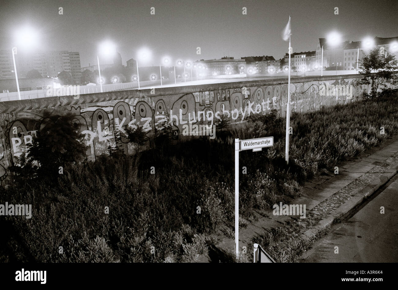 European History. The historical Berlin Wall no mans land at night in