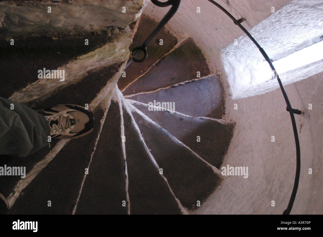 Down a spiral staircase at Bunratty Castle Shannon Ireland Stock Photo