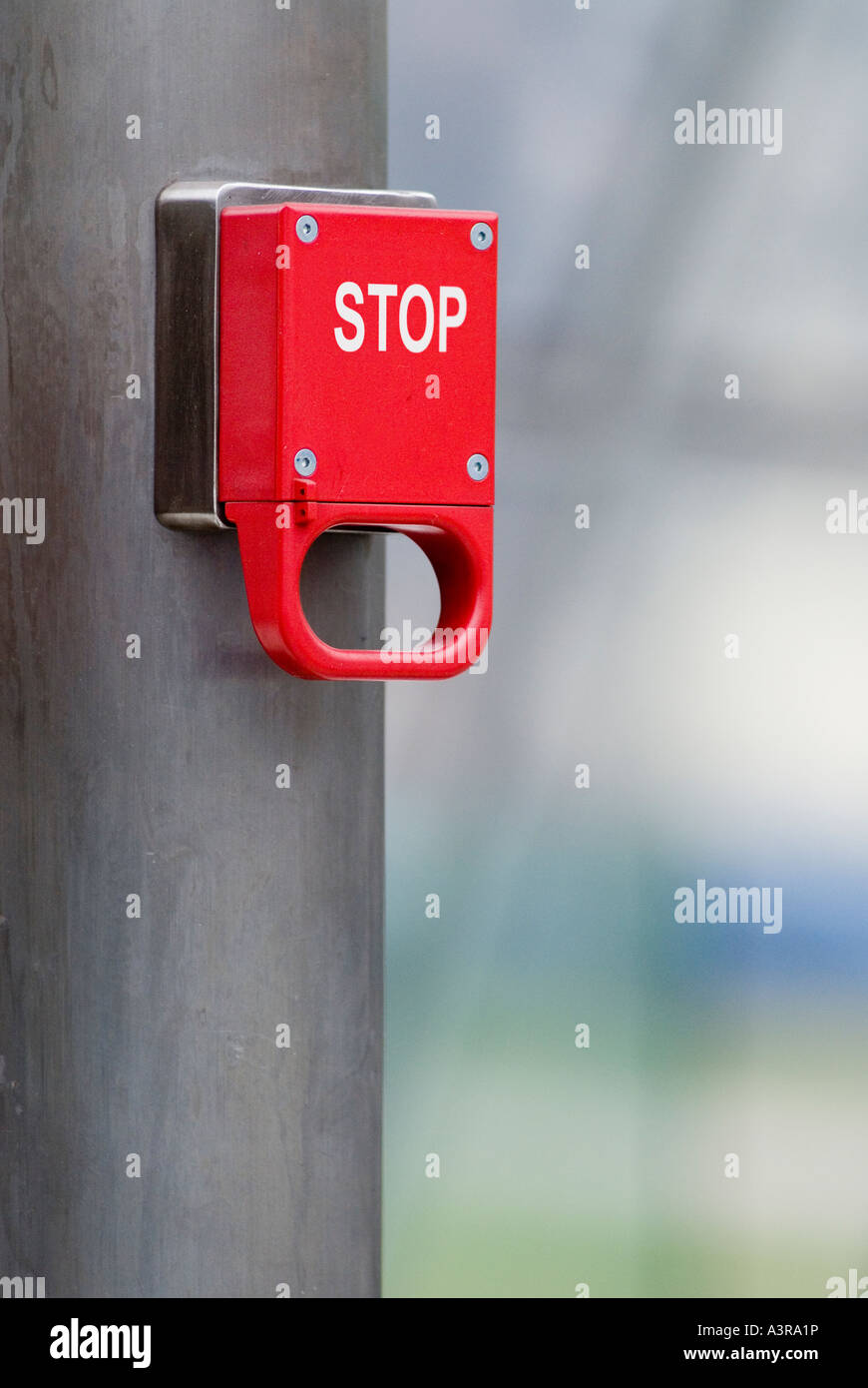 one single red emergency brake marked with word Stop Stock Photo