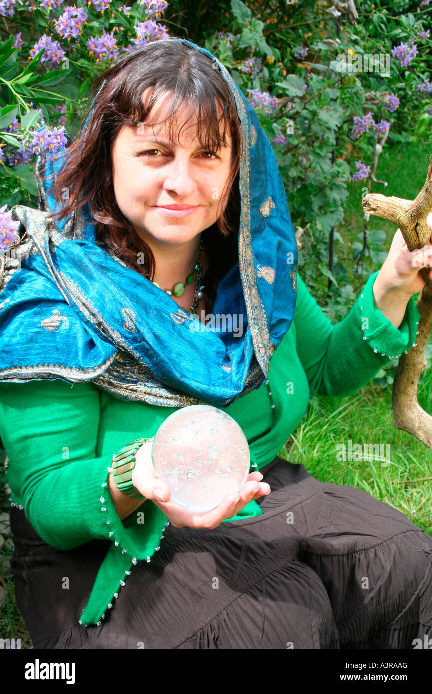 Fortune teller with crystal ball Stock Photo