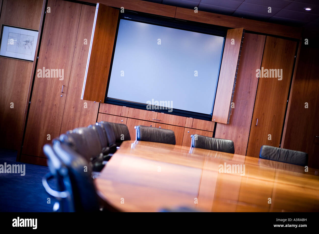 Empty Meeting Room With Large Display Screen Stock Photo