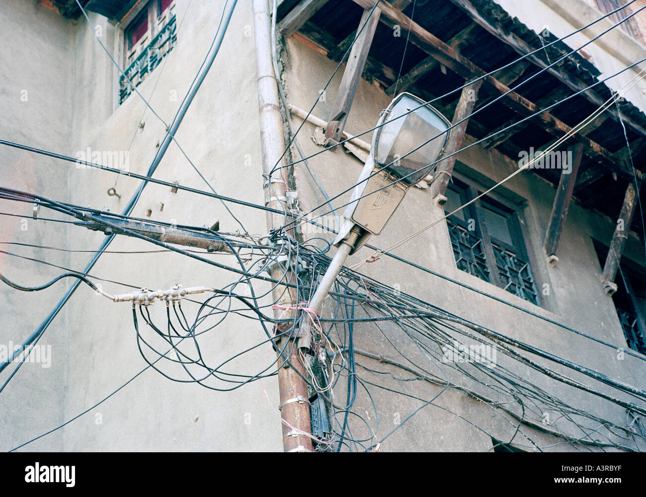 Complicated telephone wiring in Kathmandu in Nepal in Asia. Modern Life Urban City Third World Technology Technological Travel Stock Photo
