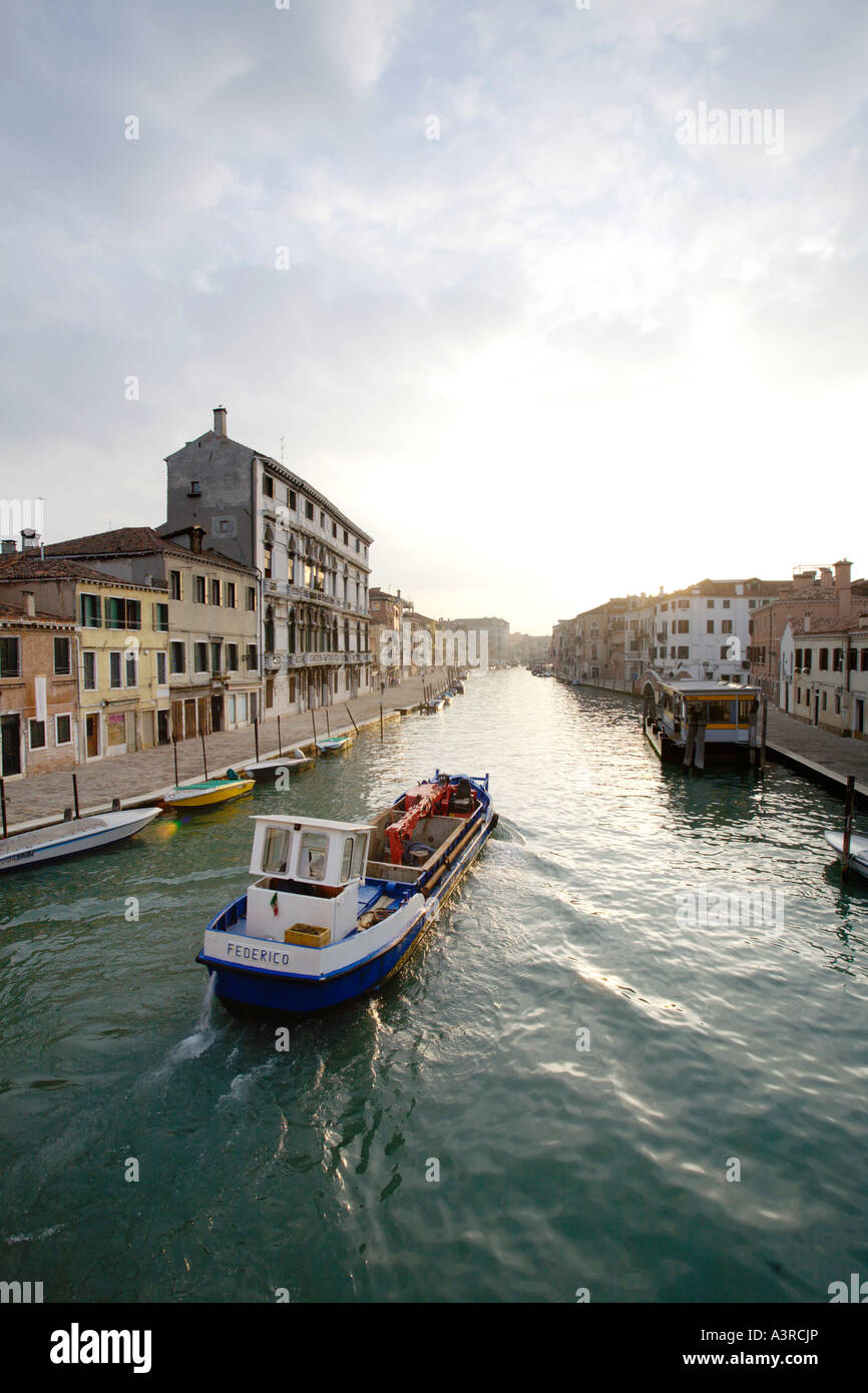 Looking up canal into morning sun. Cannaregio, Venice, Italy Stock Photo