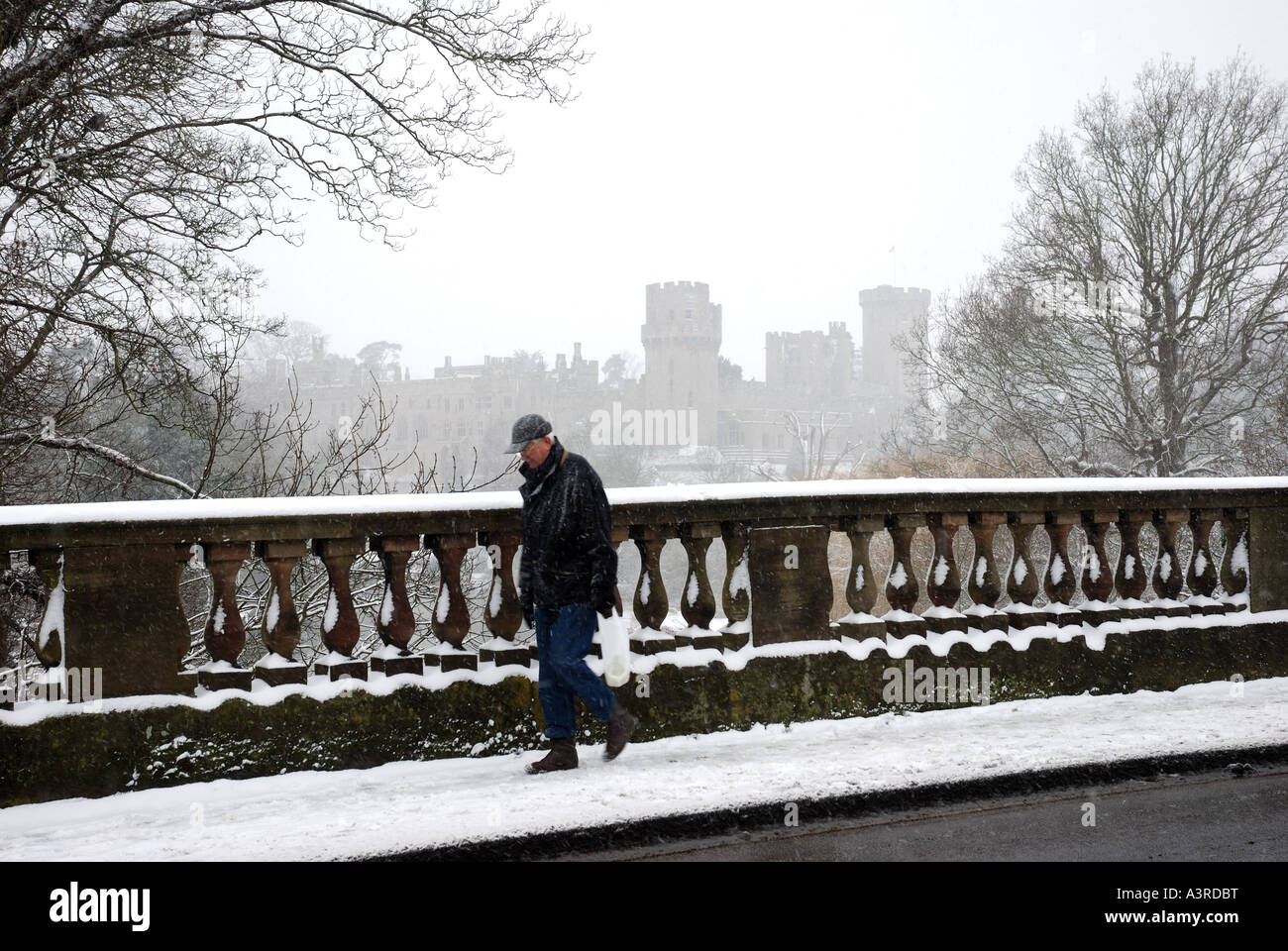 Warwick Castle from Banbury Road bridge, snowy, Warwick, Warwickshire, England, UK Stock Photo