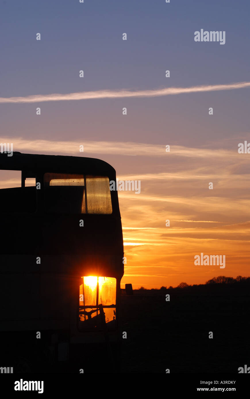 Derelict Leyland Atlantean bus at sunset, Bearley Airfield, Warwickshire, England, UK Stock Photo