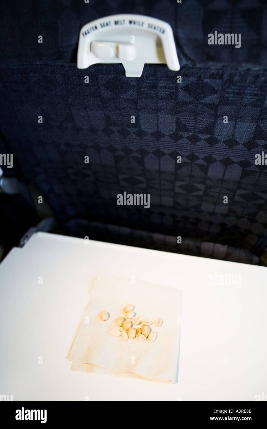 Peanuts on tray of commercial airplane Stock Photo Alamy