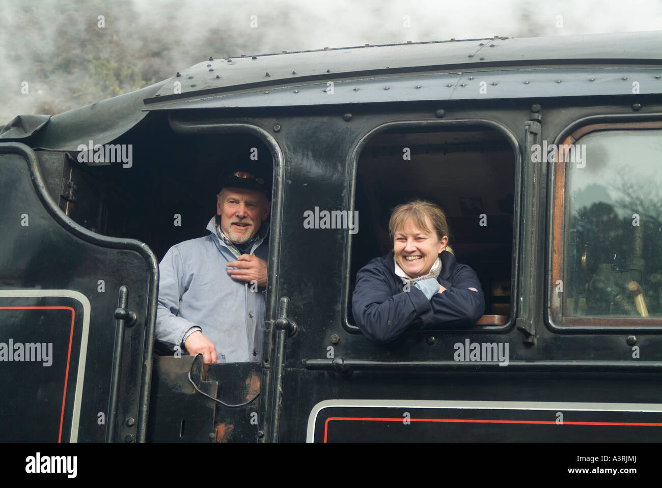 The fireman and engine driver on the footplate of the Steam train on