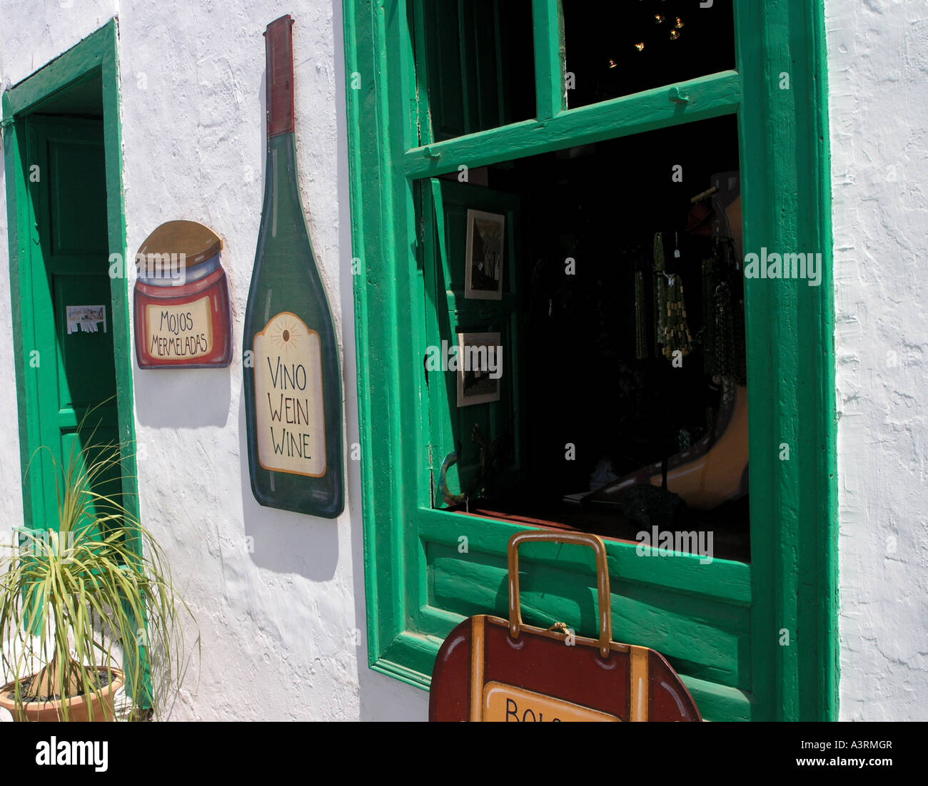 Large Wooden Wall Decoration Of Wine Bottle Hanging On A Wall