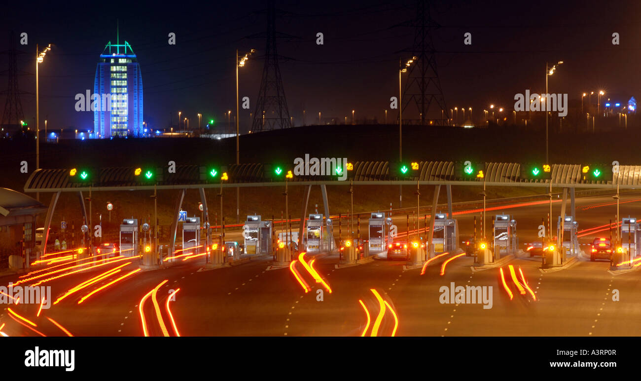 M6 TOLL ROAD BOOTHS NEAR CANNOCK,STAFFORDSHIRE WITH RAMADA HOTEL IN BACKGROUND. Stock Photo