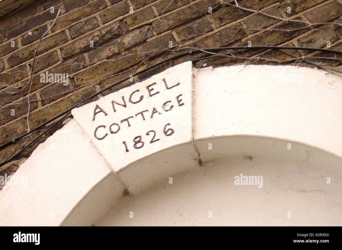 Angel Cottage keystone, Windmill Lane, Newham before demolition Stock Photo
