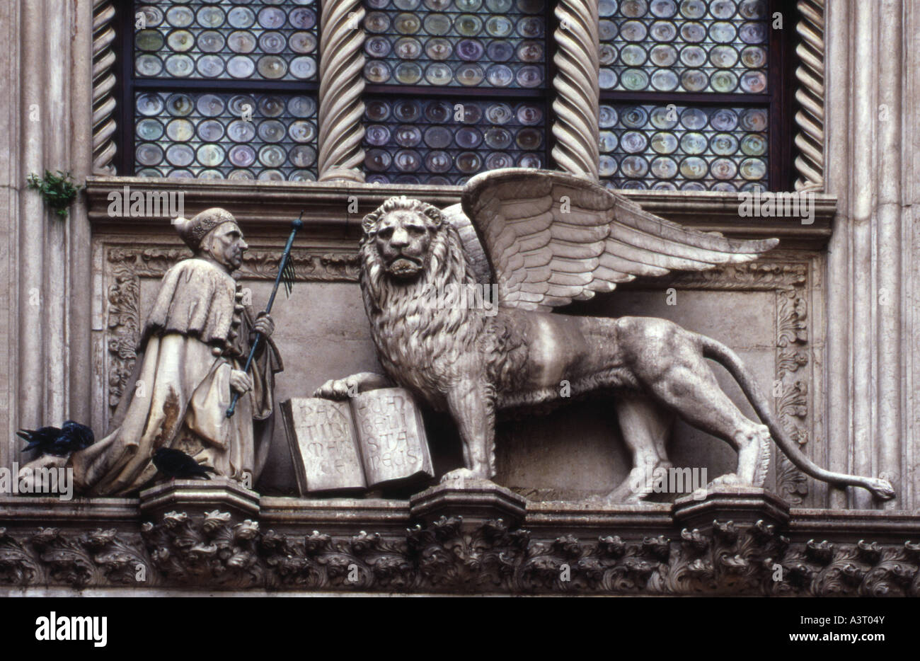 Doges Palace, Doge Foscari and Lion of St Mark, detail over Porta della Carta, Venice, Italy Stock Photo