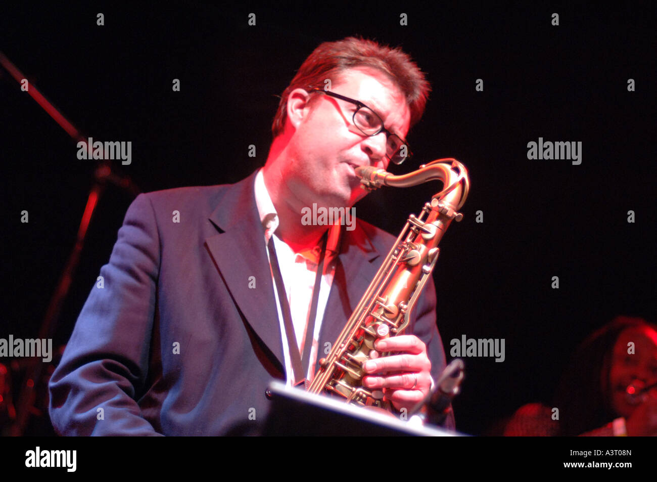The saxophonist with Jools Holland and his big band on stage performing at Aberystwyth