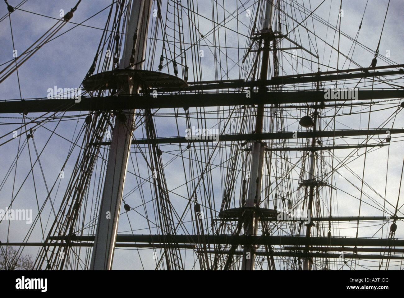 Close view of the Cutty Sark's masts and rigging in partial silhouette, Greenwich, SE10, London, UK Stock Photo