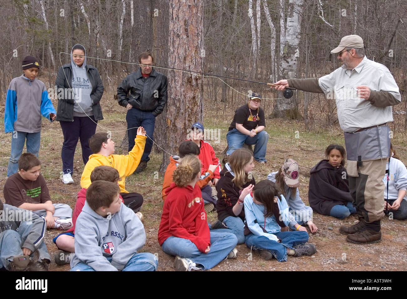 Elementary school students from Gwinn Michigan get a fly casting lesson