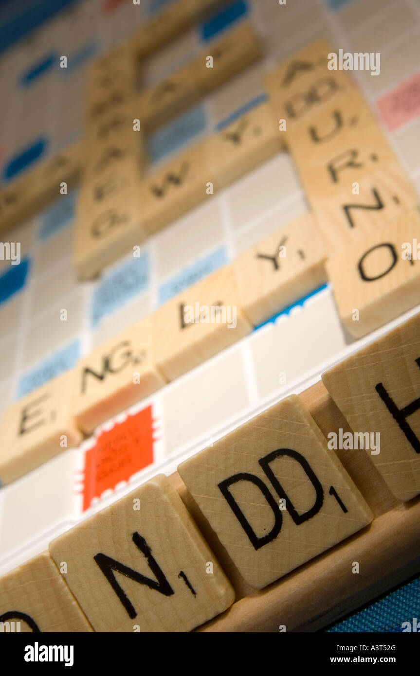WELSH language version of scrabble word board game showing double letter tiles (digraphs Stock