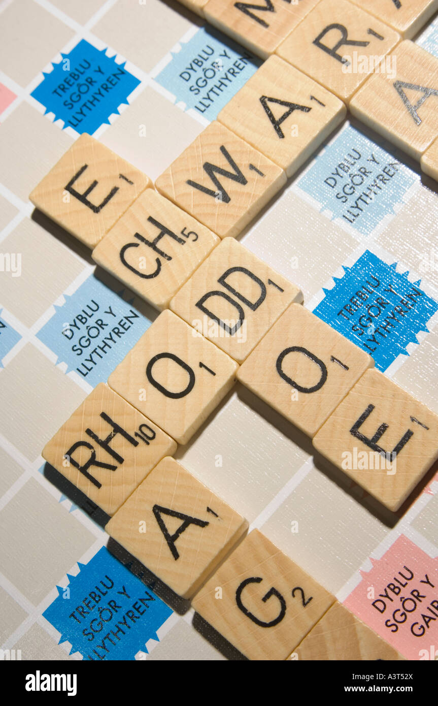 WELSH language version of scrabble word board game showing double letter tiles digraphs Stock