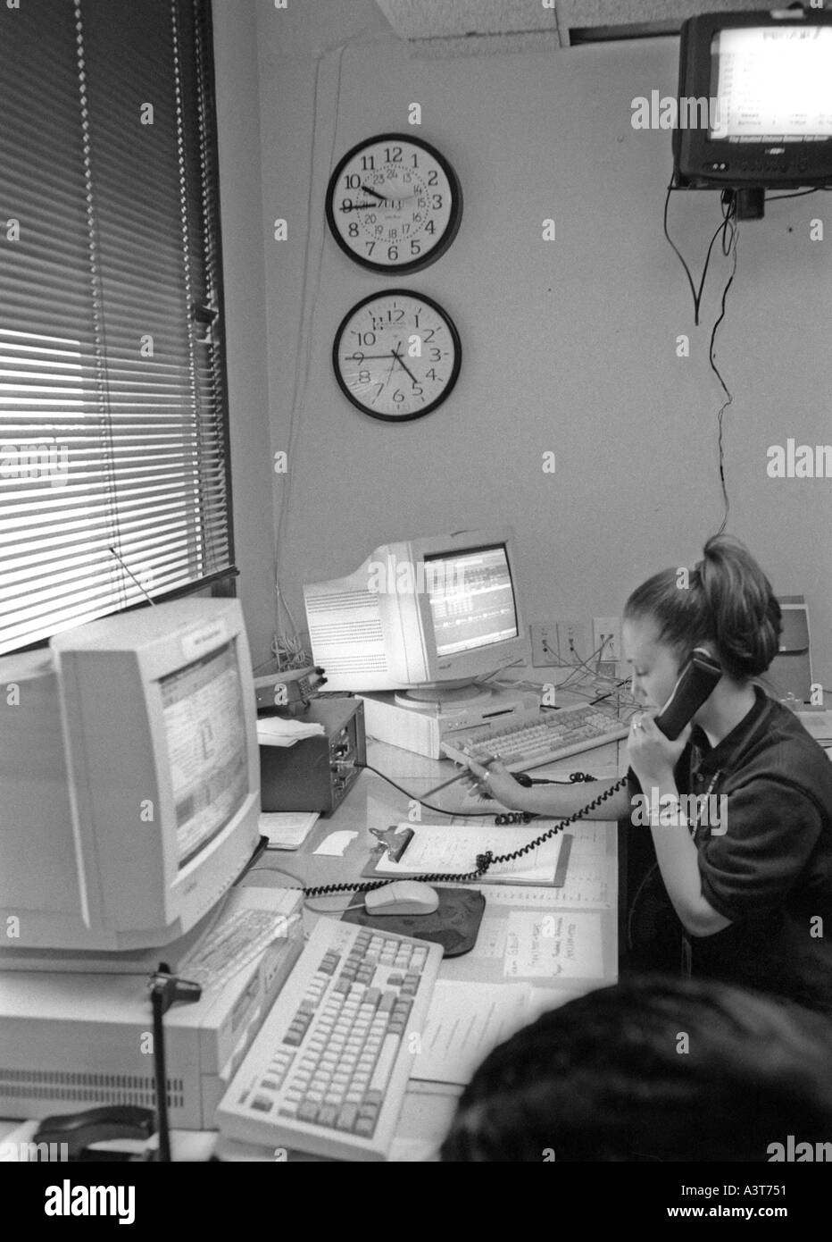 Worker in an operations center for Pro Air airline Stock Photo