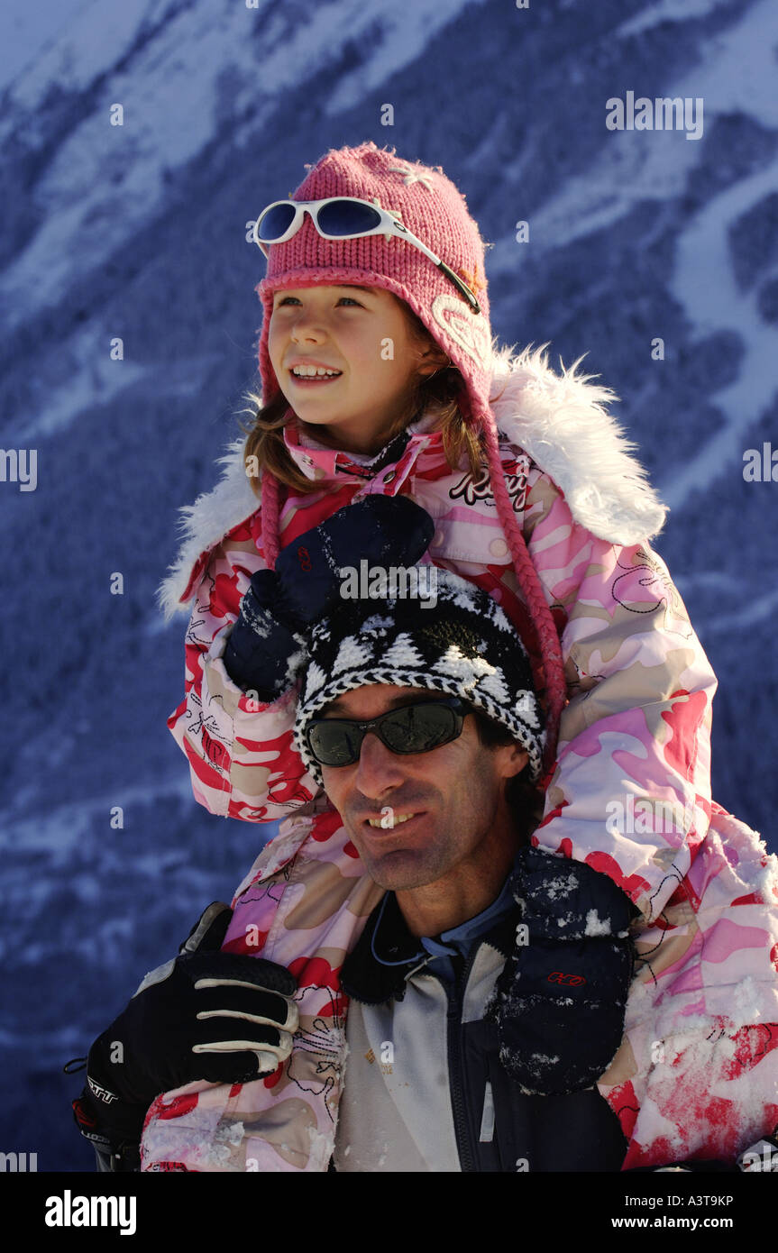 father and daugther in winter holiday, France, Alps Stock Photo