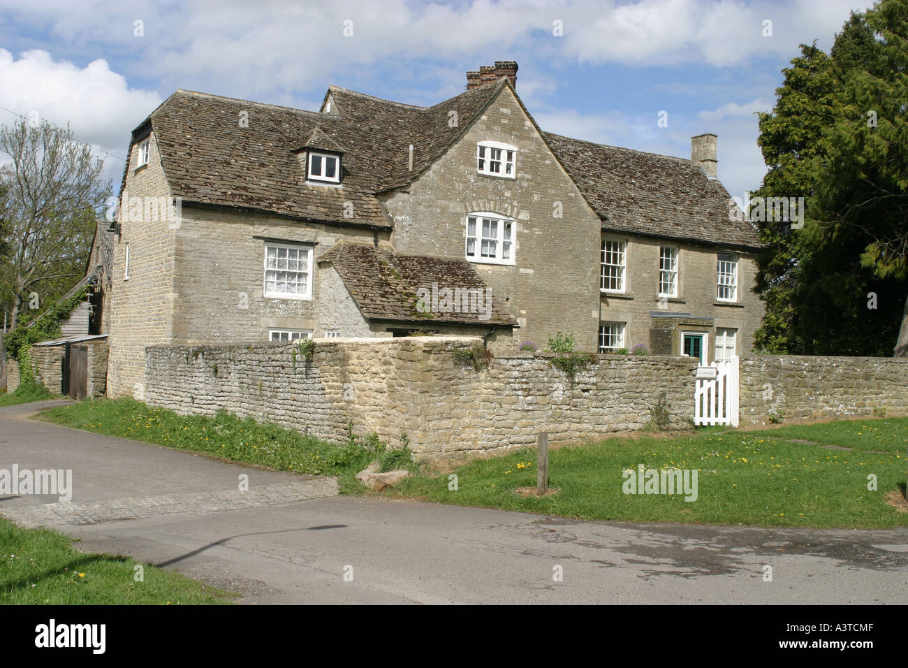 Manor house and village green Rodbourne Cheney Swindon Stock Photo Alamy